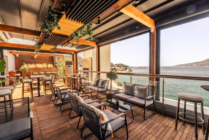 Aegean Sea lounge terrace at Sirius Samos with comfortable outdoor seating