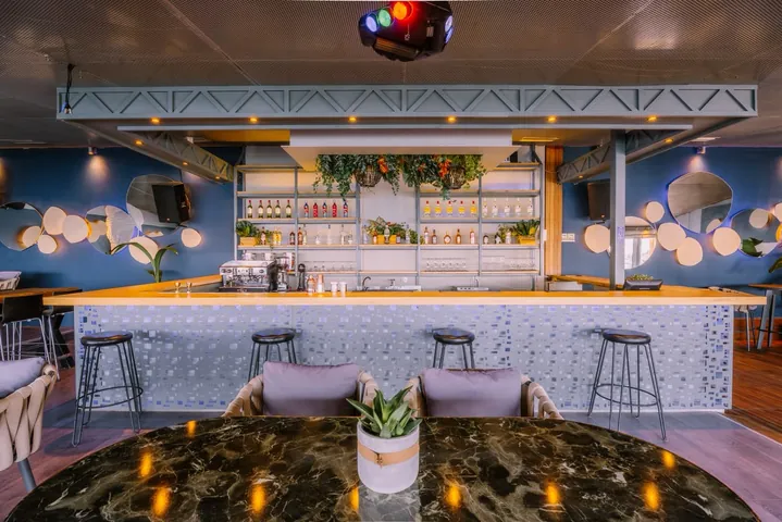 Front view of the cocktail bar at Sirius Samos with modern lighting