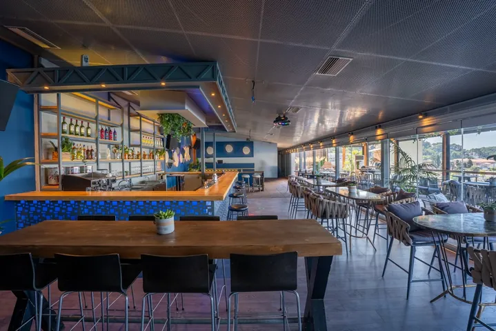 Sirius Samos nightlife interior with ambient blue lighting and spacious seating